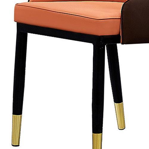 2X Dining Chair Orange Colour Leatherette Upholstery Black And Gold Legs Steel with Powder Coating - John Cootes